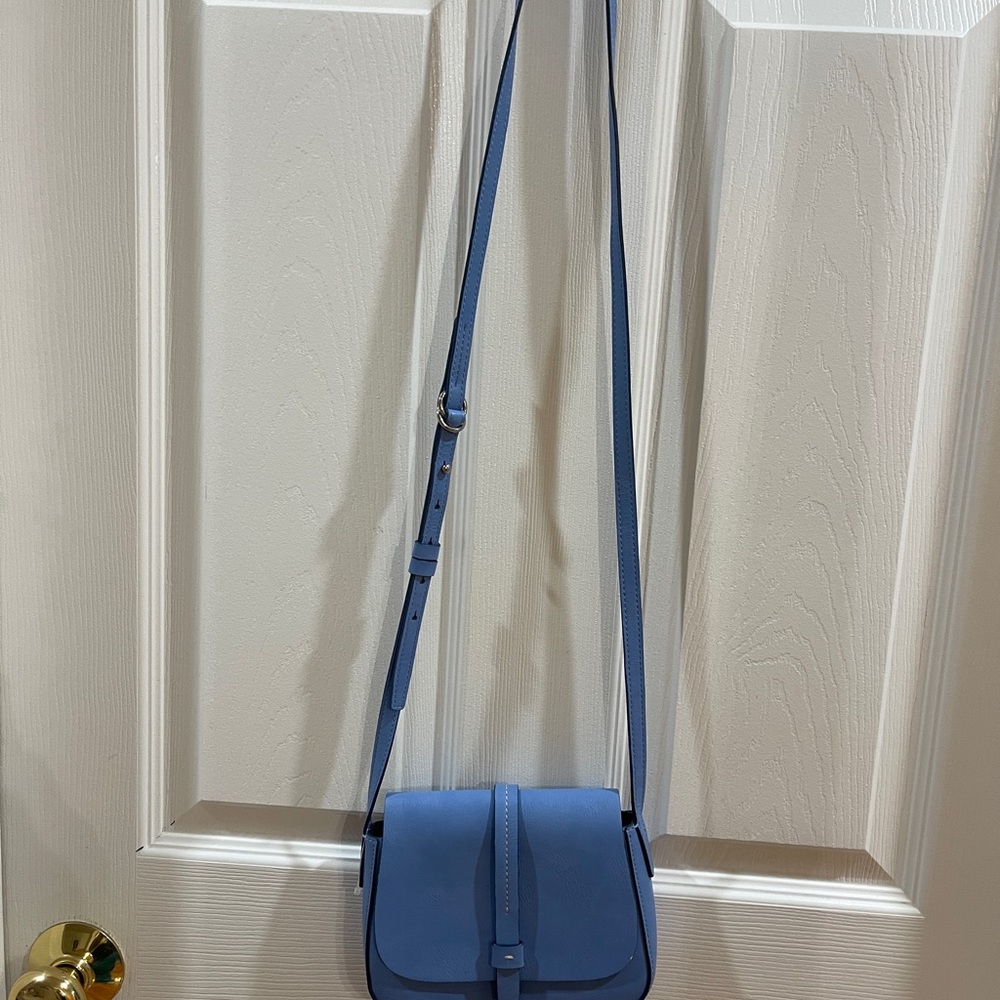 Vibrant Blue Crossbody Bag with Adjustable Strap and Flap Closure